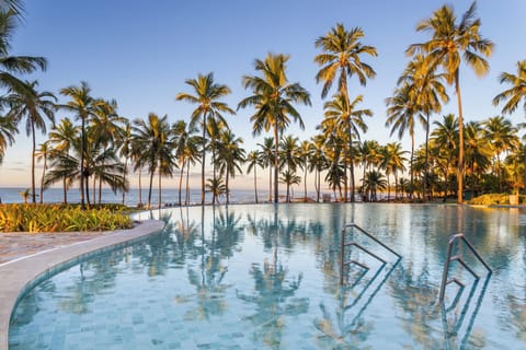 Outdoor pool, pool umbrellas, sun loungers