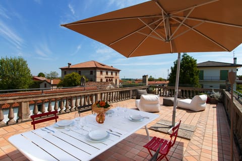 our charming terrace with a view to Pontemanco and our Euganean Hills