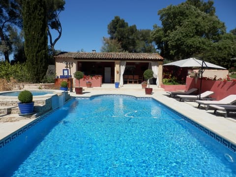 Outdoor pool, open 9 AM to 8 PM, pool umbrellas, sun loungers