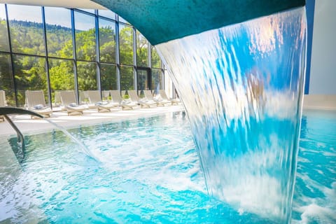 Indoor pool, open 9:00 AM to 9:00 PM, sun loungers, lifeguards on site