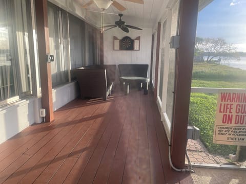 Darts and seating area in the back of the house