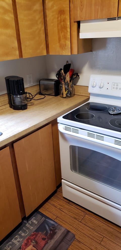 Stove, toaster and coffee pot.