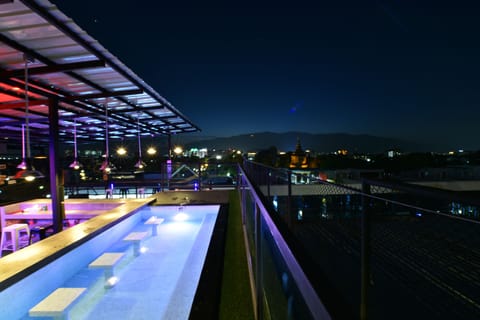 Outdoor pool, open 8 AM to 11:00 PM, sun loungers