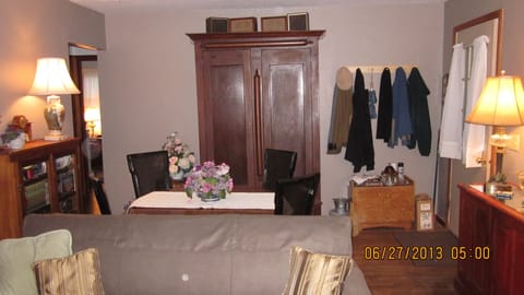 Living room Sofa & Eating game area & entry coat hooks & bench seat view South 