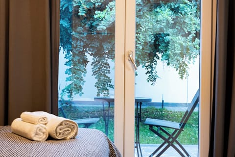 Double Room, Garden View | Individually furnished, desk, free WiFi, bed sheets