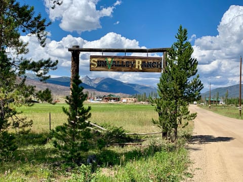 Entrance to the meadow close to the cabin-post fire