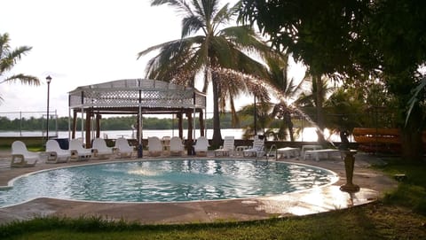 Outdoor pool, open 8 AM to 9 PM, pool umbrellas, sun loungers