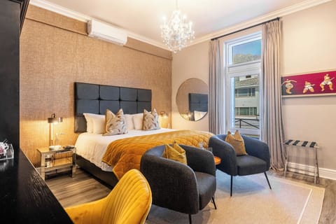 Heritage Deluxe Room with Balcony | In-room safe, individually decorated, desk, soundproofing