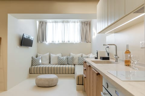 Deluxe Semi-Basement Apartment | Private kitchen | Fridge, stovetop, coffee/tea maker, electric kettle