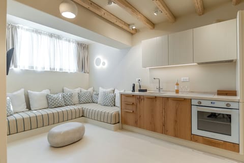 Deluxe Semi-Basement Apartment | Private kitchen | Fridge, stovetop, coffee/tea maker, electric kettle