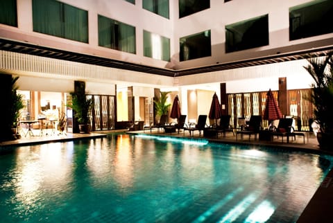 Outdoor pool, pool umbrellas, sun loungers