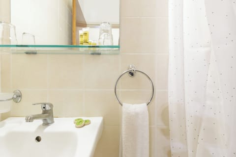 Shower, free toiletries, hair dryer, towels