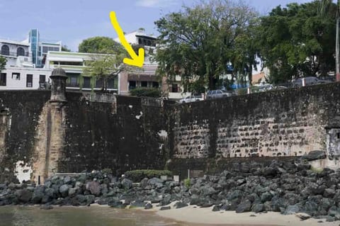 Arrow points to  house . Harbor walkways are directly below house  