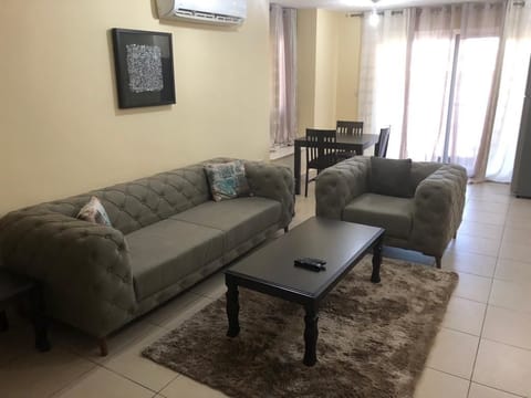 Comfort Apartment, 2 Double Beds, Accessible | Living room | Flat-screen TV