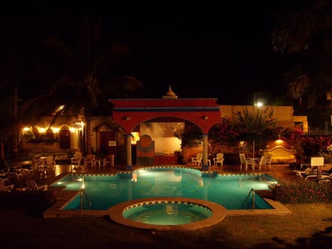 Outdoor pool, open 8 AM to 9 PM, pool umbrellas, sun loungers