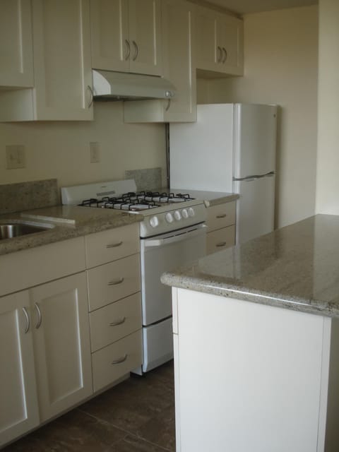 Kitchenette near third bedroom.  Stocked with dishes, utensils, pots and pans.