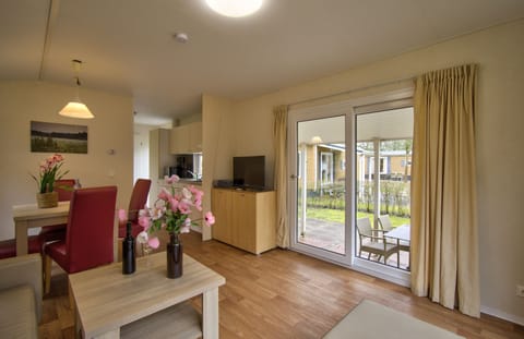 Comfort Mobile Home, 2 Bedrooms | Living area | Flat-screen TV