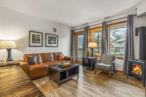 Unit 1:  Living Room w/ luxury leather European-style Queen-Size Sofabed 