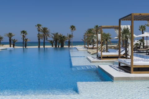 Indoor pool, 2 outdoor pools, open open 24 hours, pool umbrellas