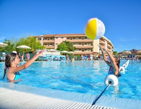 Seasonal outdoor pool, open 10:00 AM to 8:00 PM, pool umbrellas
