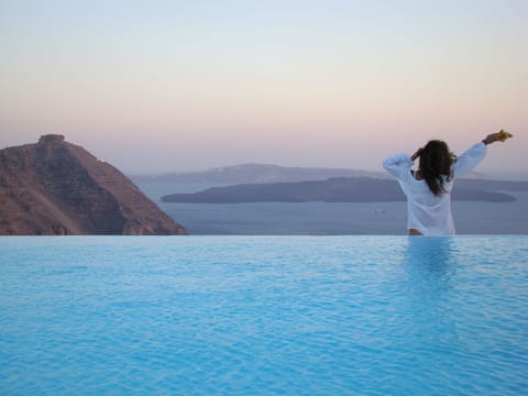 Outdoor pool, pool umbrellas, sun loungers