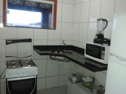 Basic Apartment, Multiple Beds, Non Smoking | Private kitchen | Fridge, microwave, oven, stovetop