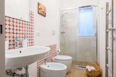 Apartment, 1 Bedroom, Garden View (Acqua e Vino) | Bathroom | Shower, hair dryer, bathrobes, slippers