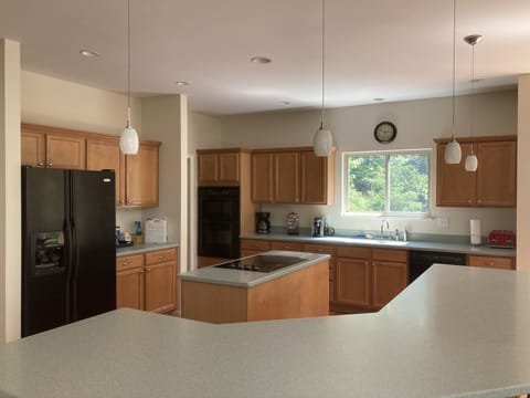 Kitchen with stove top island