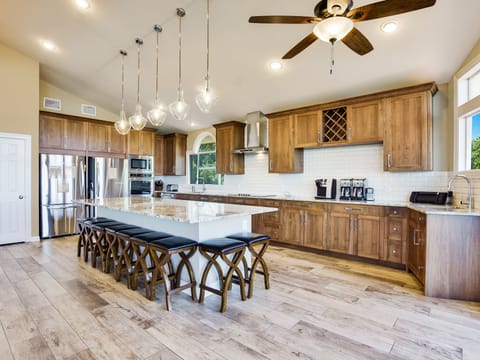 Spacious gourmet kitchen with duel appliances & oversized breakfast bar seating