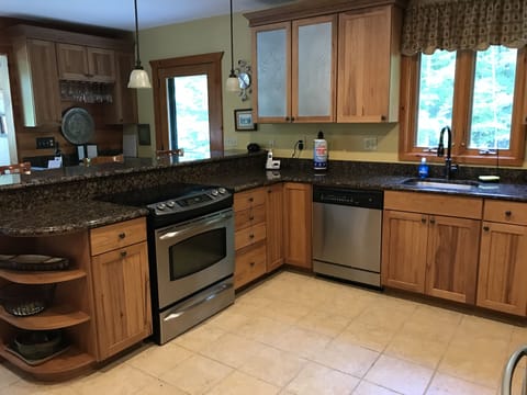 Gourmet kitchen with GE Profile appliances
