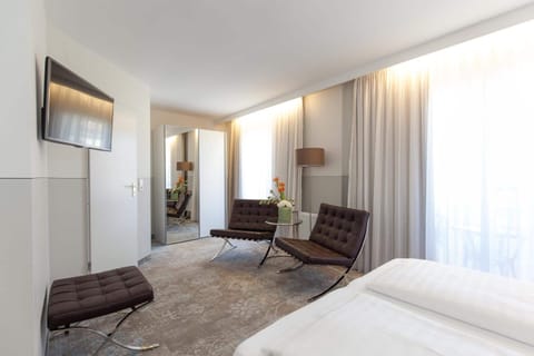 Premium bedding, individually furnished, desk, blackout drapes
