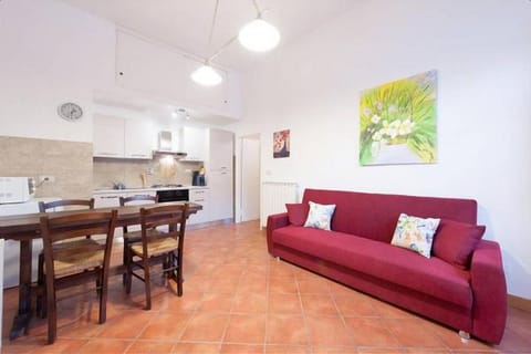 Apartment, 1 Bedroom | Living area | Flat-screen TV