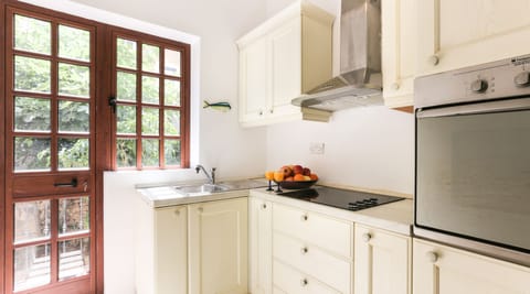 Shared fridge, oven, stovetop, electric kettle