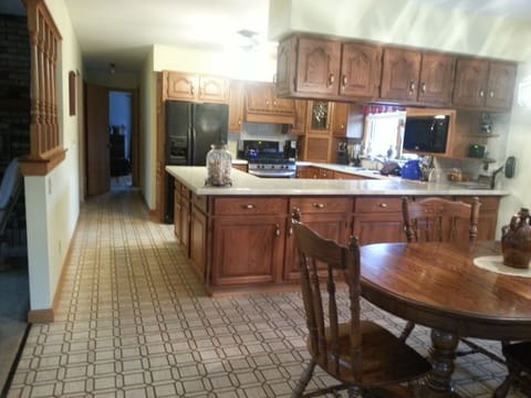 Keurig coffee pot, slow cooker, griddle, among items stocked in the kitchen.