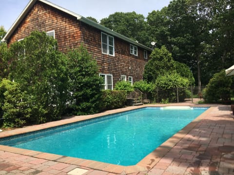Heated 40ft saline pool and deck in separate secure fenced area with all day sun