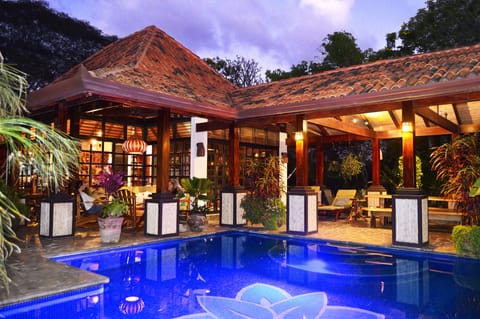 Breezeway and main house with pool. 