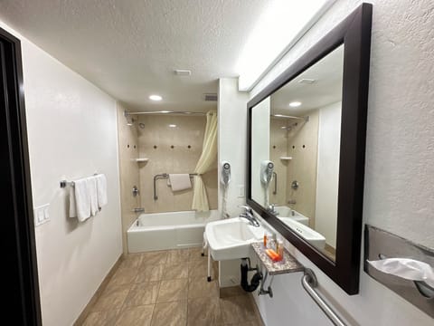 Room, 2 Queen Beds, Accessible Bathtub | Bathroom | Free toiletries, hair dryer, towels