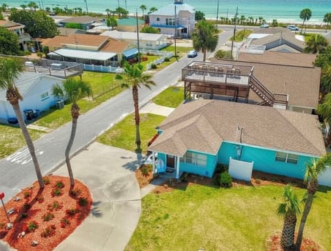 One block to beach! Painted turquoise blue in 2025 and fenced yard