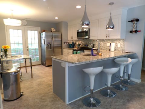 An updated kitchen with new appliances and bar seating to get your day started!