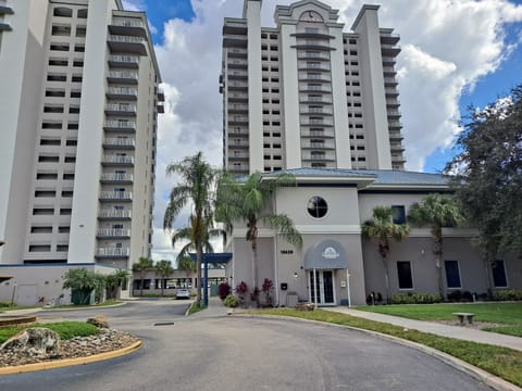 Entrance to 2 towers Front desk in small building before towers. Guest Parking

