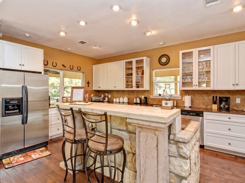 View of kitchen with serving bar.