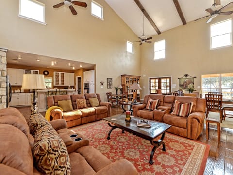 Another  view of living room, looking towards kitchen and dining area.  