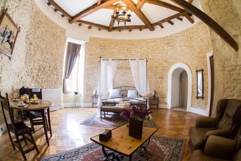 Honeymoon Double Room (Tourelle) | Living room | Flat-screen TV