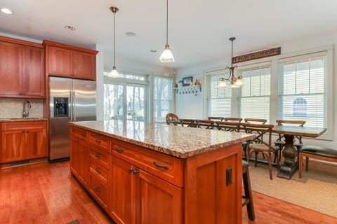 The kitchen has abundant natural lighting.