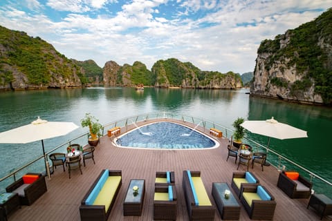 Outdoor pool, pool umbrellas, sun loungers