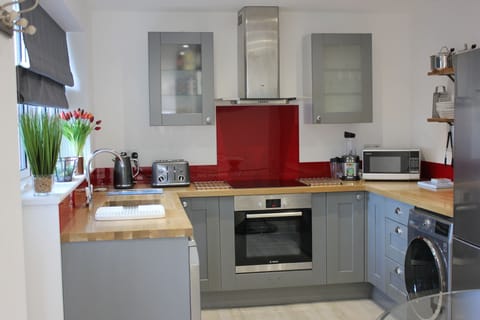 Fully Stocked Kitchen all new equipment. Dishwasher, Oven & Hob, Washing Machine/Dryer, Microwave.