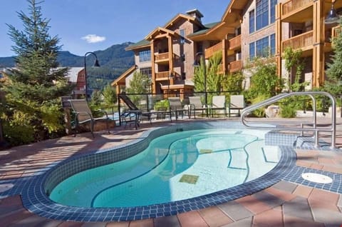 Enjoy a dip in the outdoor pool while taking in the gorgeous surrounding views.
