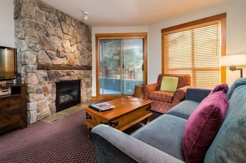 Kick up your feet and relax in the spacious living area after a day on the slopes.
