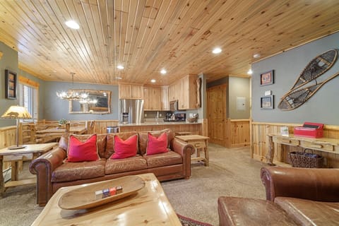 Warm, open-concept family, dining and kitchen. 