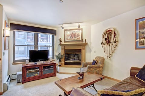 Warm up in front of the classic fireplace in our cozy unit!